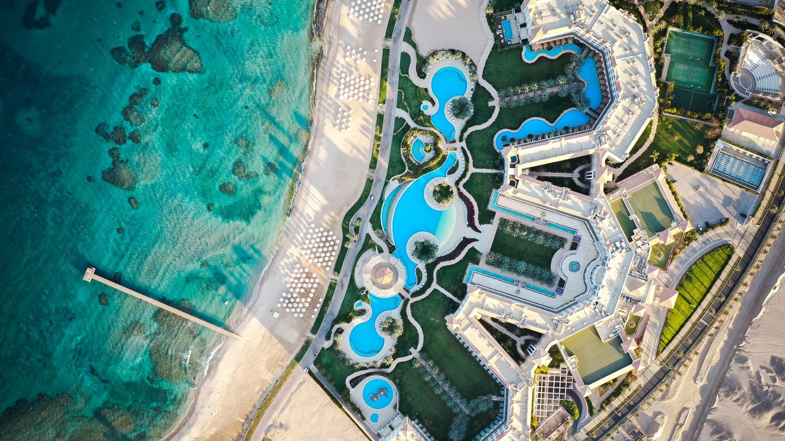 Aerial view of a Hurghada Red Sea resort, beach and turquoise coral water